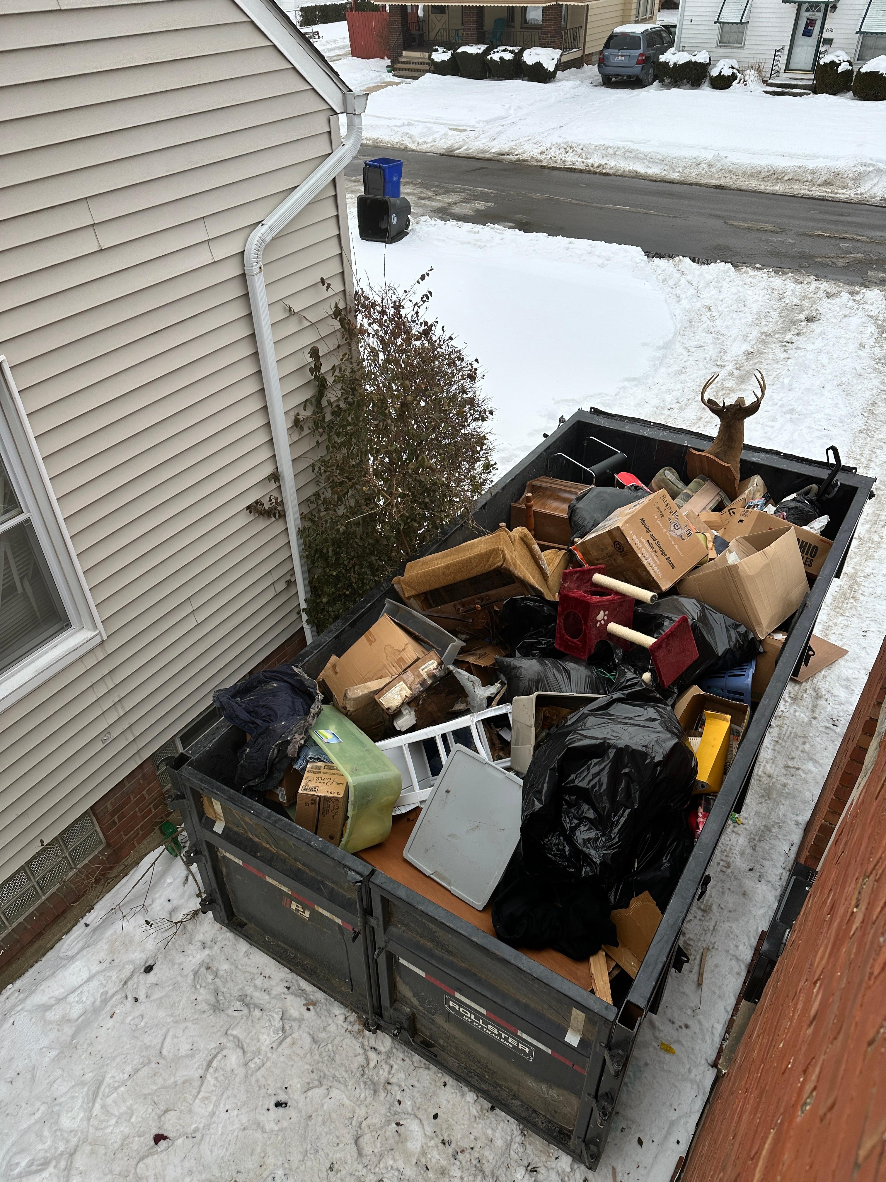 Loaded trailer and cleanout work on site